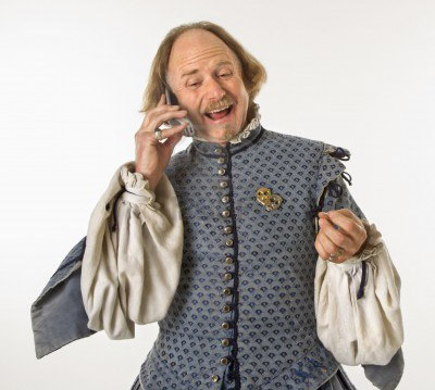 2145261-william-shakespeare-in-period-clothing-talking-on-cell-phone